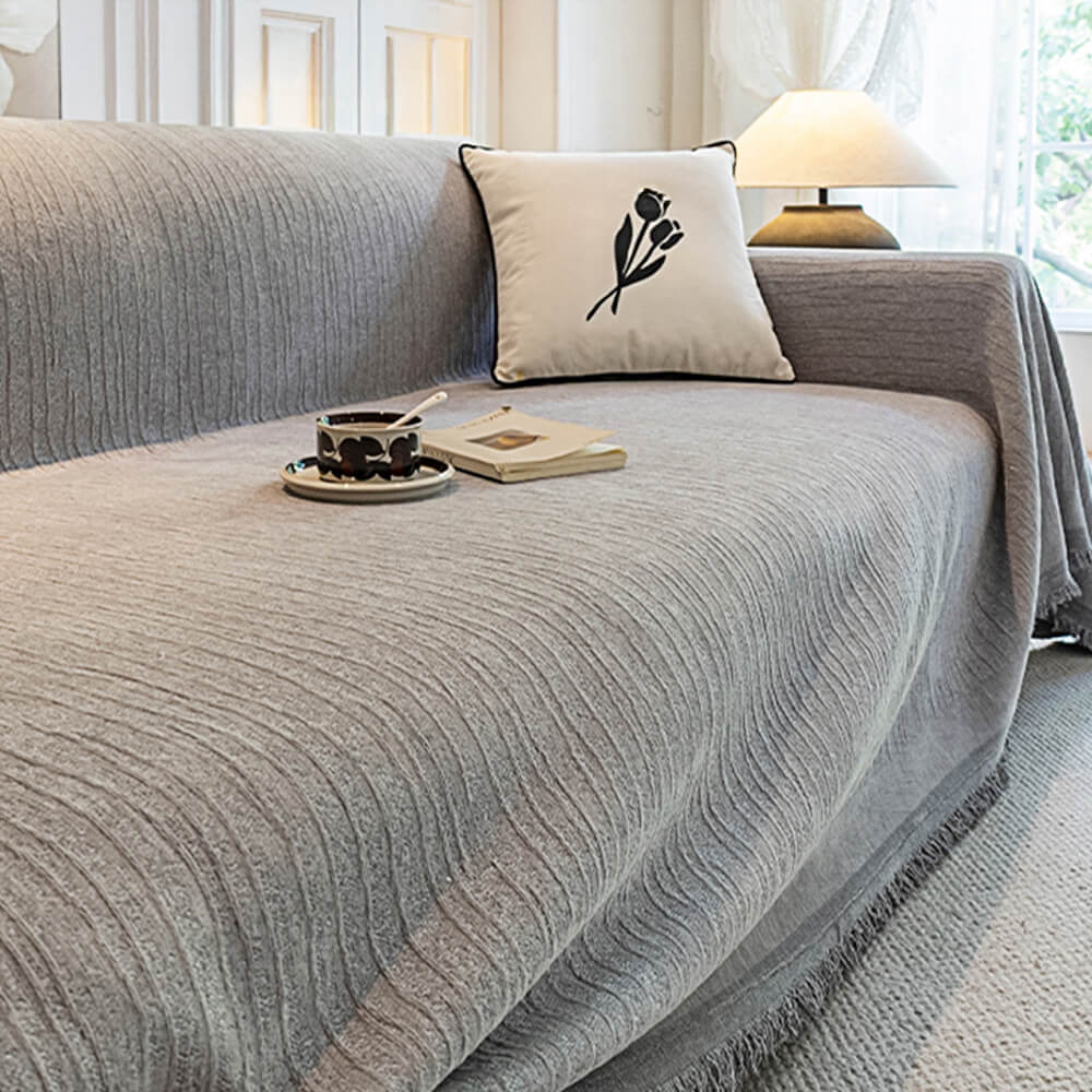 Housse de canapé crème en chenille texturée résistante aux griffures adaptée aux animaux