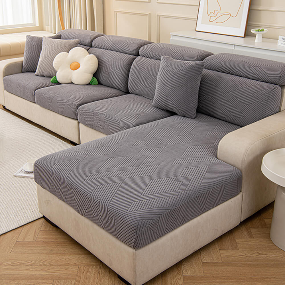 Housse de canapé magique stretch pleine largeur motif géométrique moderne