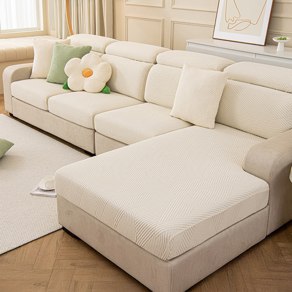 Housse de canapé magique stretch pleine largeur motif géométrique moderne