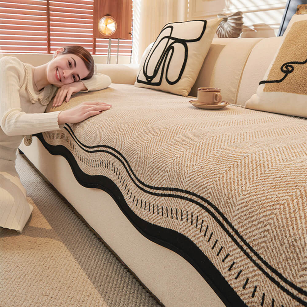 Housse de canapé en chenille à chevrons antidérapante avec bords ondulés