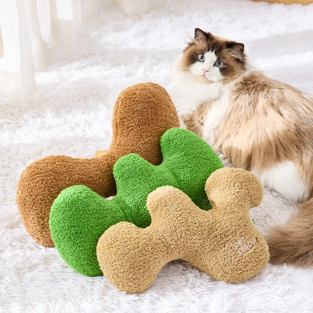 Coussin jouet pour chien en forme d’os avec couineur
