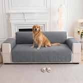 Housse de canapé en une pièce de couleur unie, imperméable, avec des sangles élastiques