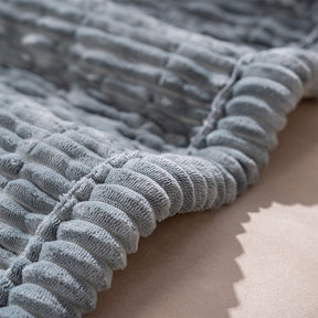 Tapis pour animaux en flanelle douce imperméable, respirant, anti-dérapant pour canapé.