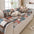 Housse canapé confortable avec lignes artistiques et matelassage, protection antidérapante.