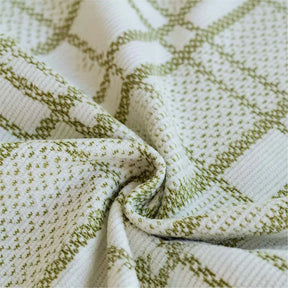 Housse de canapé en chenille respirante à motif à carreaux