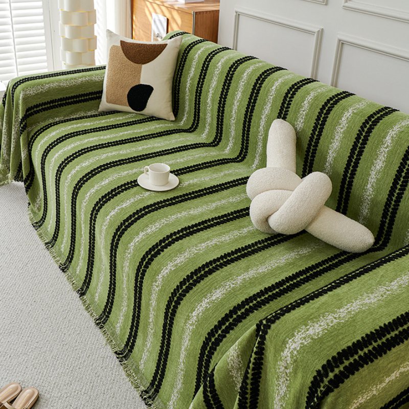 Housse de canapé en chenille avec franges et motifs à rayures