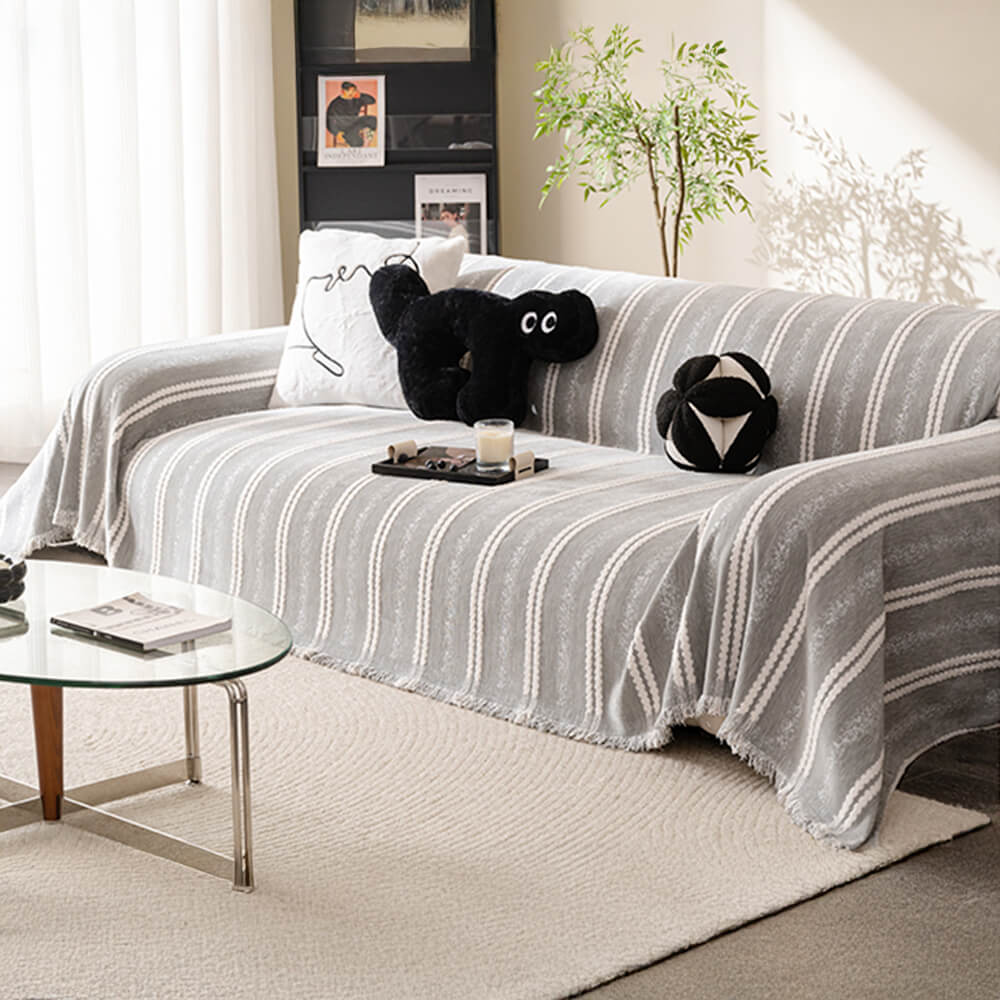 Housse de canapé en chenille avec franges et motifs à rayures