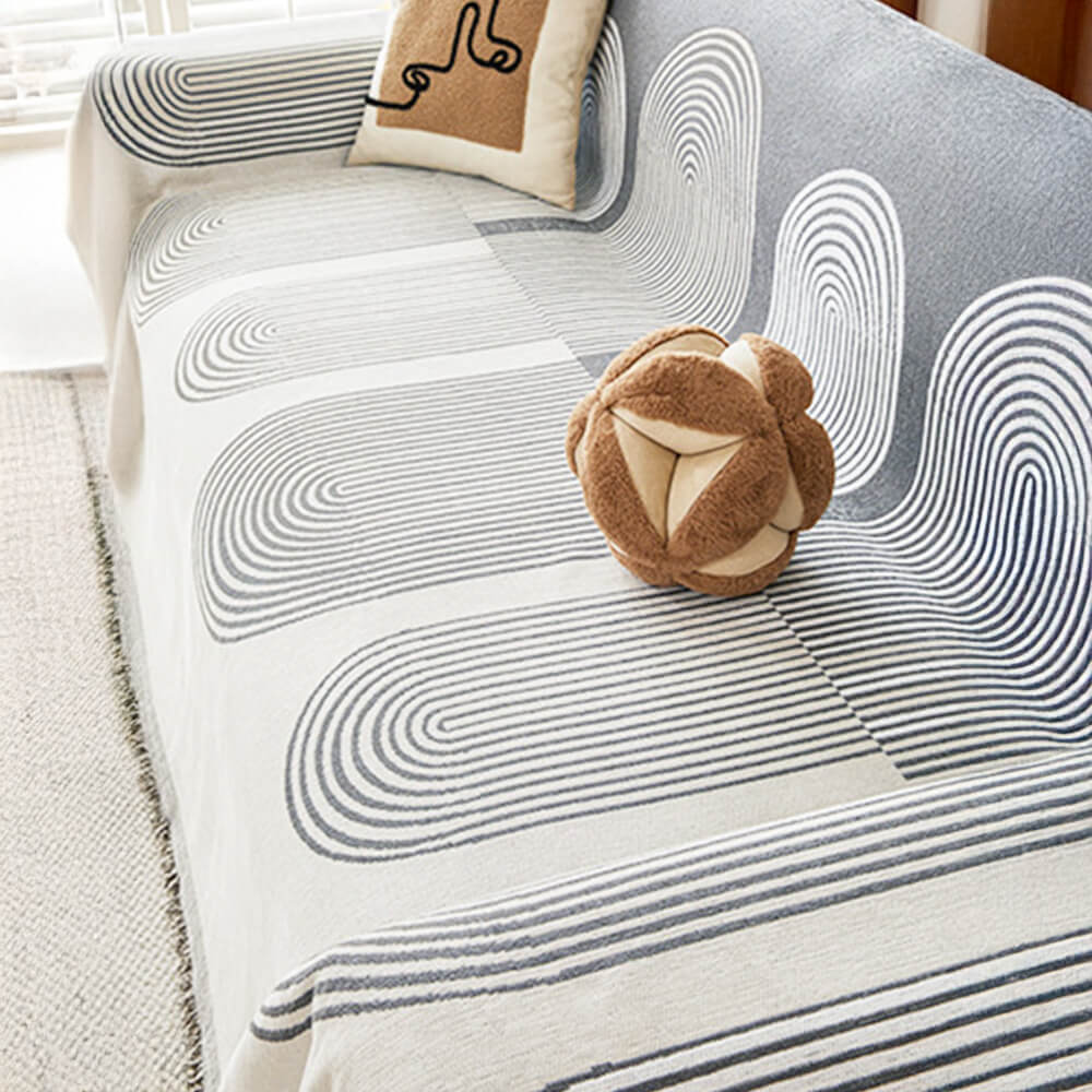 Housse de canapé réversible en chenille à motif géométrique