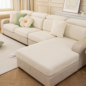 Housse de canapé magique stretch pleine largeur motif géométrique moderne