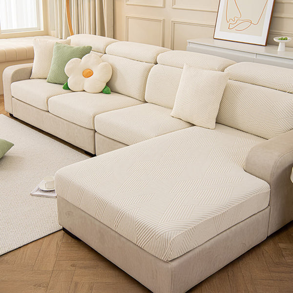 Housse de canapé d'angle extensible magique stretch pleine largeur motif géométrique moderne