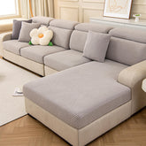 Housse de canapé magique stretch pleine largeur motif géométrique moderne