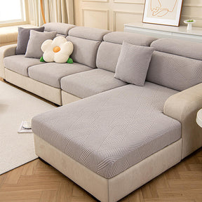 Housse de canapé magique stretch pleine largeur motif géométrique moderne