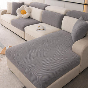 Housse de canapé magique stretch pleine largeur motif géométrique moderne