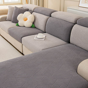 Housse de canapé magique stretch pleine largeur motif géométrique moderne