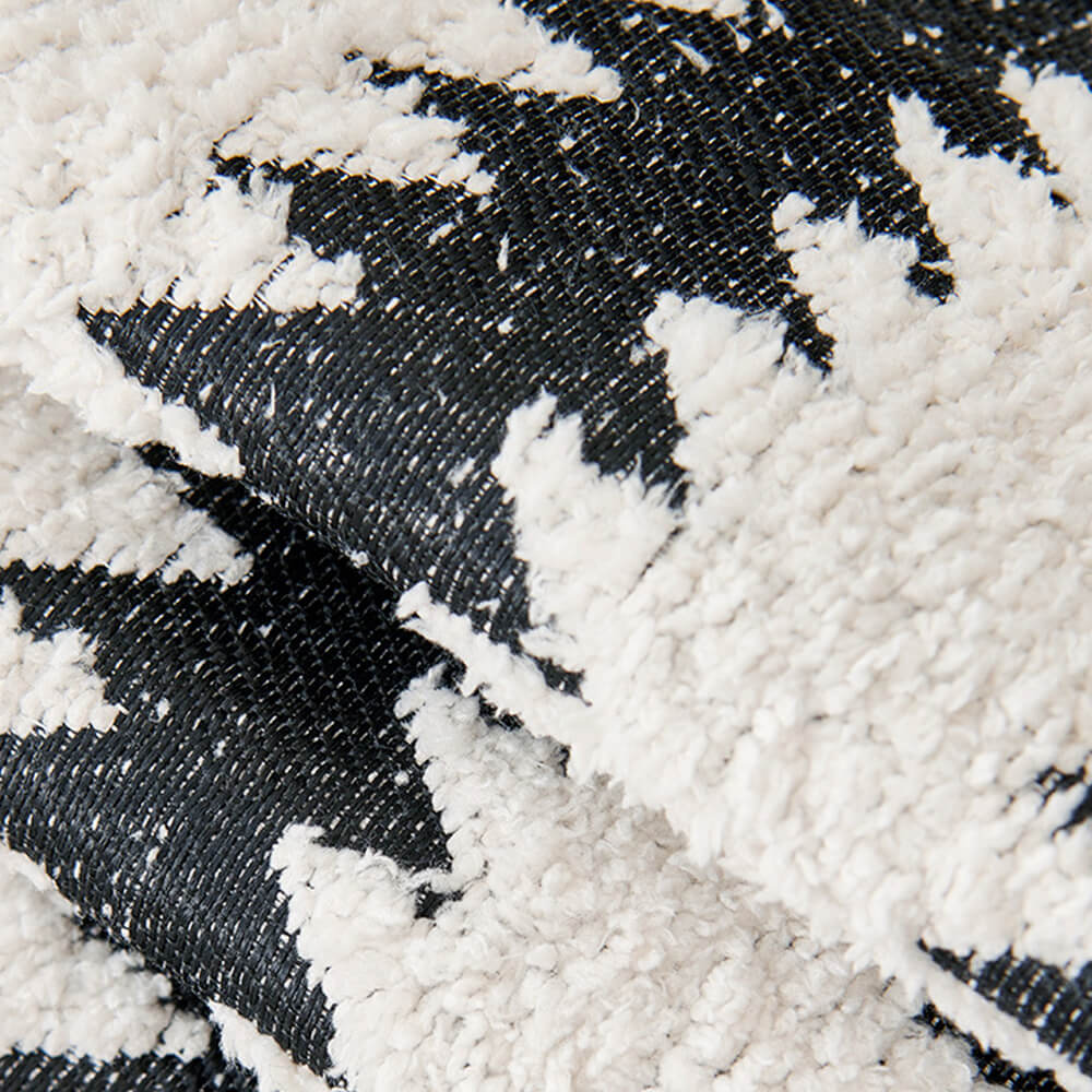 Housse de canapé en chenille à rayures chevron modernes et bords ondulés