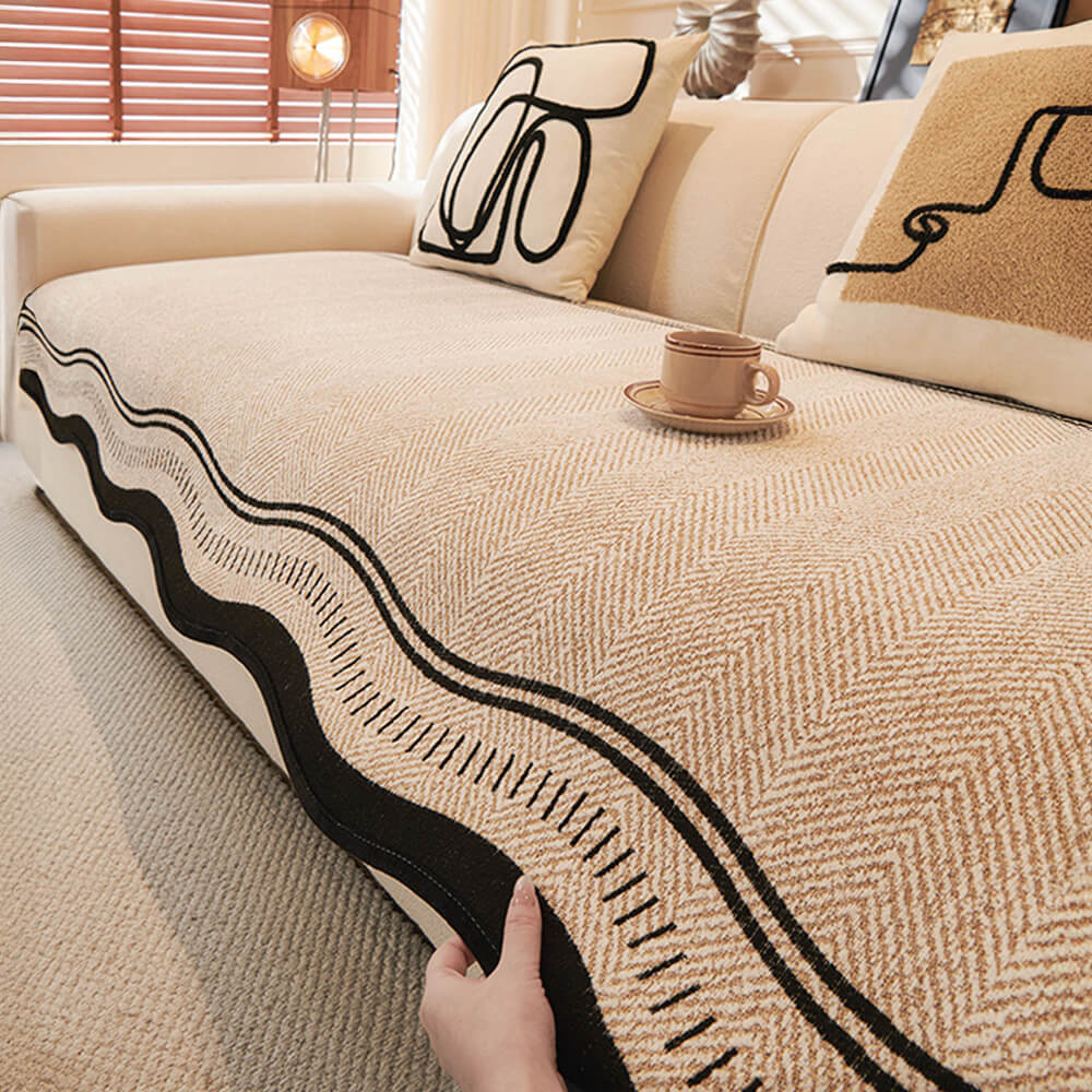 Housse de canapé en chenille à chevrons antidérapante avec bords ondulés