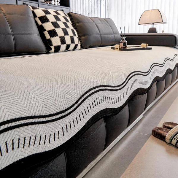 Housse de canapé en chenille à chevrons antidérapante avec bords ondulés