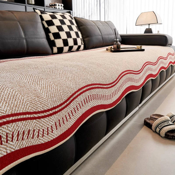 Housse de canapé en chenille à chevrons antidérapante avec bords ondulés