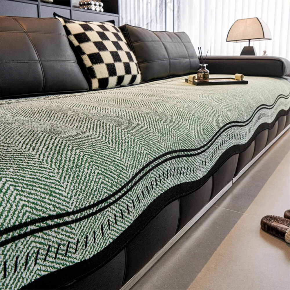Housse de canapé en chenille à chevrons antidérapante avec bords ondulés