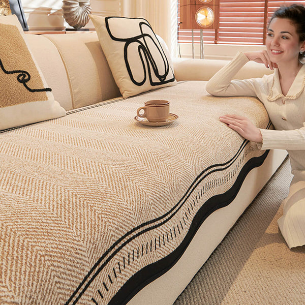 Housse de canapé en chenille à chevrons antidérapante avec bords ondulés