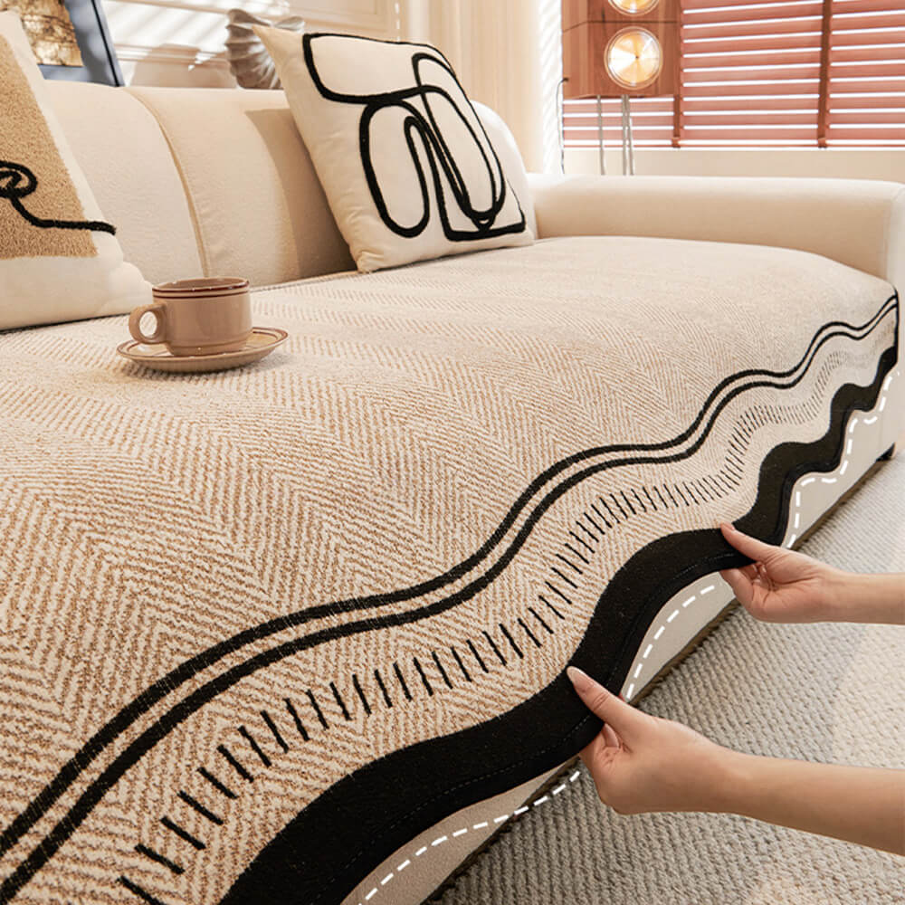 Housse de canapé en chenille à chevrons antidérapante avec bords ondulés