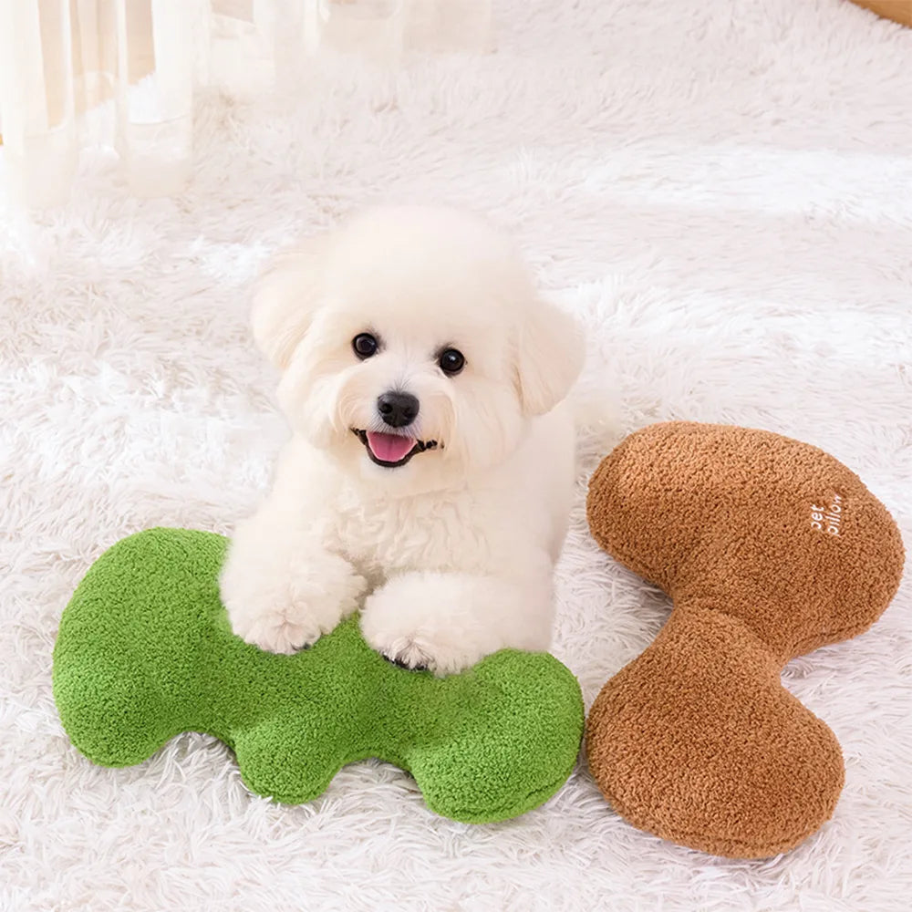 Coussin jouet pour chien en forme d’os avec couineur