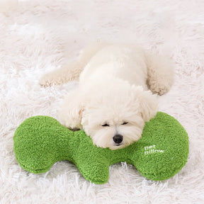 Coussin jouet pour chien en forme d’os avec couineur