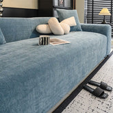 Housse de canapé extensible 3 place en tissu chevrons, pleine couverture, confortable et résistante aux griffures.
