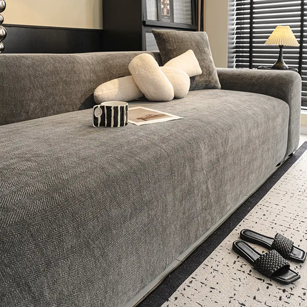 Housse de canapé extensible 3 place en tissu chevrons, pleine couverture, confortable et résistante aux griffures.