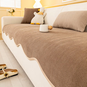 Housse canapé chenille chevrons minimaliste antidérapante bords ondulés