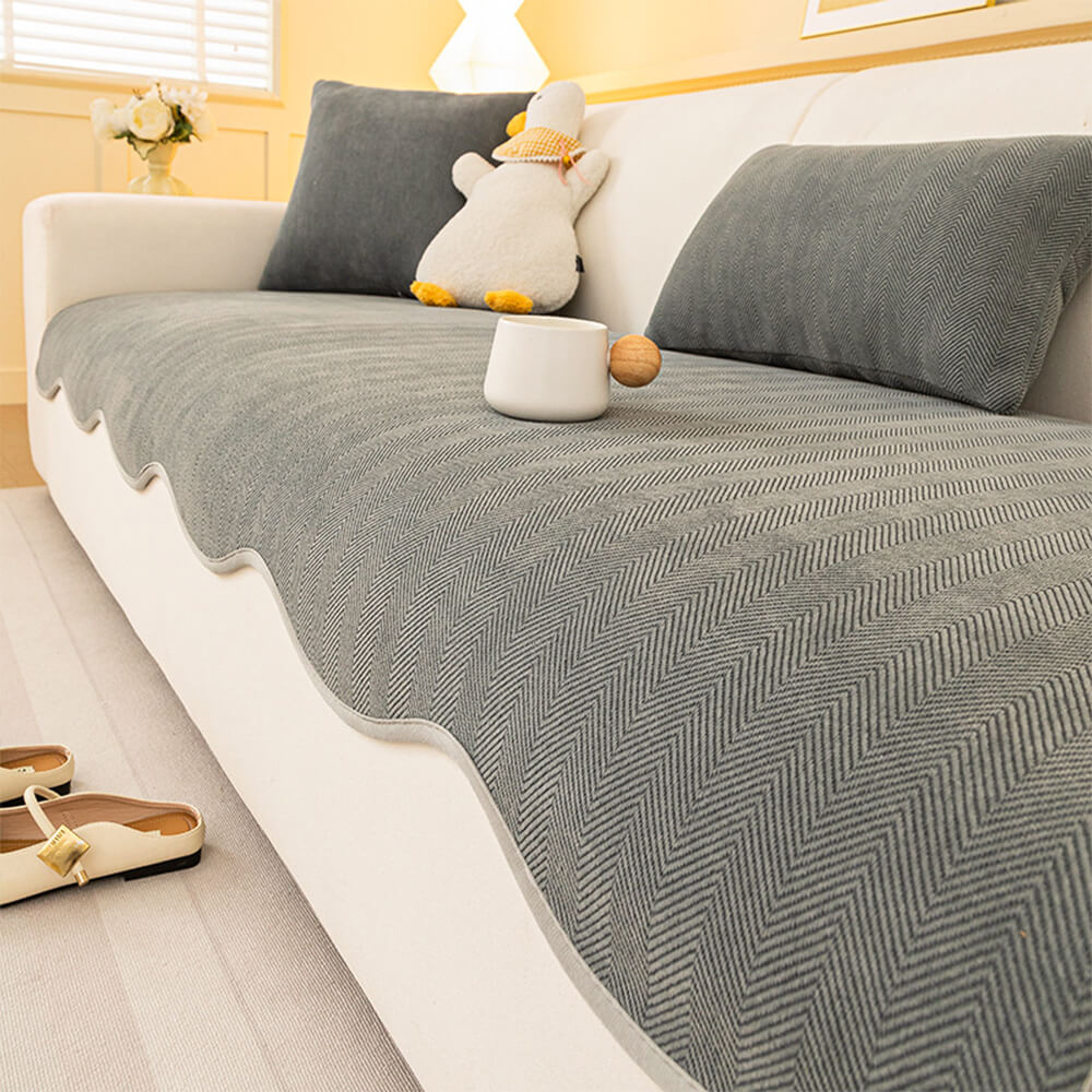 Housse canapé chenille chevrons minimaliste antidérapante bords ondulés
