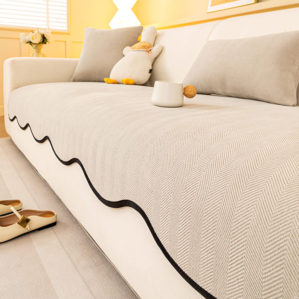 Housse canapé chenille chevrons minimaliste antidérapante bords ondulés