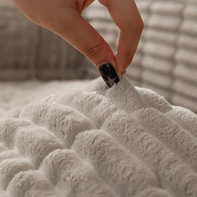 Housse de canapé en flanelle imperméable et confortable, protection antidérapante.
