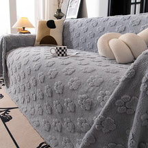 Housse de canapé douce en peluche motif pattes