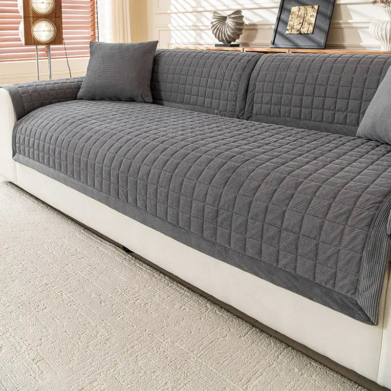 Housse de canapé quiltée carrée simple et confortable, anti-dérapante.