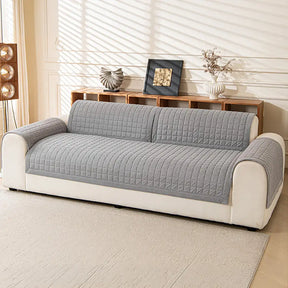 Housse de canapé quiltée carrée simple et confortable, anti-dérapante.