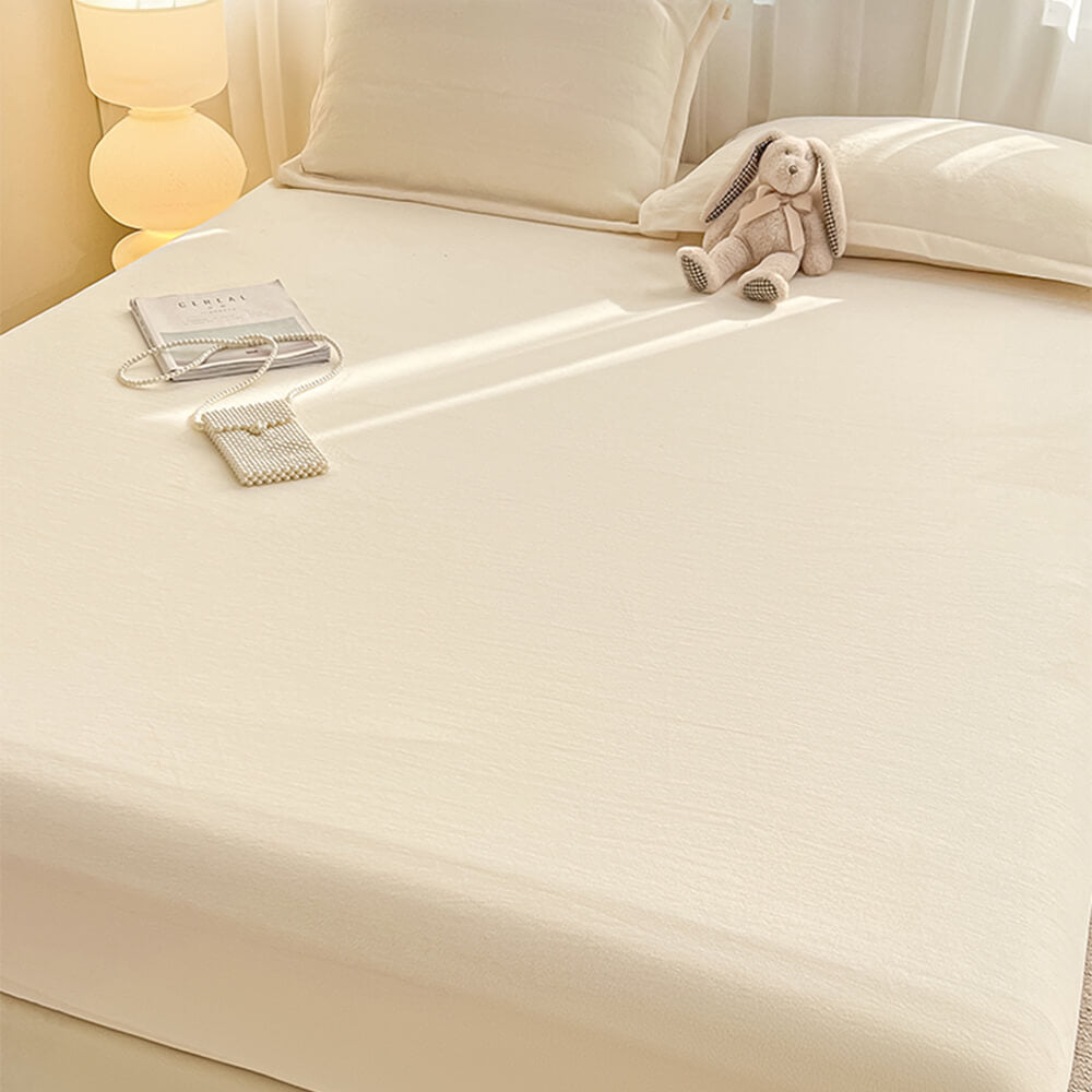 Housse de matelas en velours de lait uni