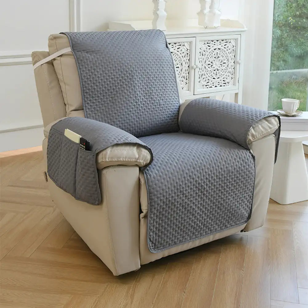 Housse de canapé en une pièce de couleur unie, imperméable, avec des sangles élastiques
