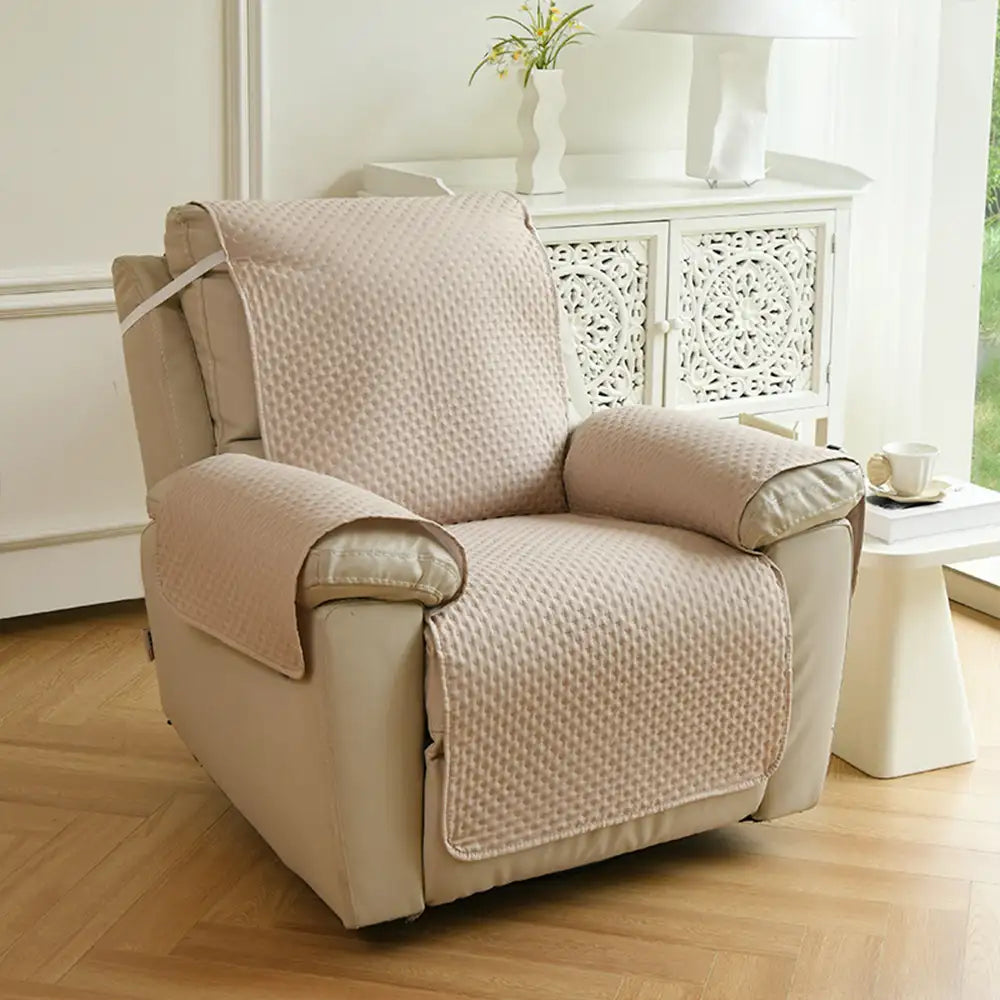 Housse de canapé en une pièce de couleur unie, imperméable, avec des sangles élastiques