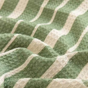 Housse de canapé à motifs géométriques multicolores - Design moderne pour un intérieur stylé