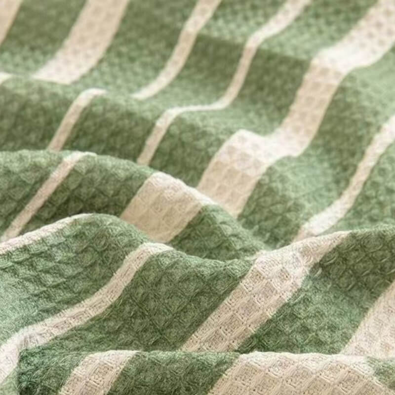 Housse de canapé à motifs géométriques multicolores - Design moderne pour un intérieur stylé