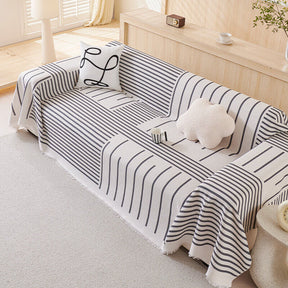 Housse de canapé à motifs géométriques multicolores - Design moderne pour un intérieur stylé