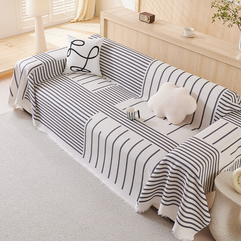 Housse de canapé à motifs géométriques multicolores - Design moderne pour un intérieur stylé