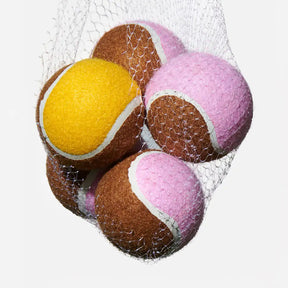 Jouet interactif en forme de balle de tennis pour chien