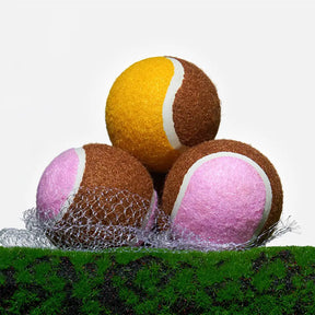 Jouet interactif en forme de balle de tennis pour chien