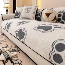 Housse de canapé en polaire douce avec empreinte de patte, antidérapante.