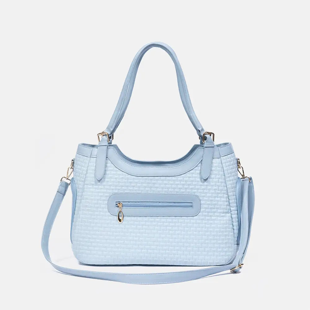 Sac de transport pour animaux en cuir synthétique respirant et portable, adapté pour les chiens et les chats, idéal pour les voyages et les vétérinaires.