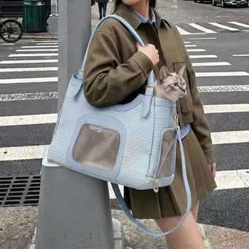 Sac de transport pour animaux en cuir synthétique respirant et portable, adapté pour les chiens et les chats, idéal pour les voyages et les vétérinaires.