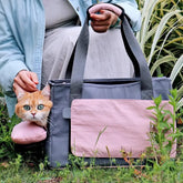 Sac de transport pour chat respirant à parois souples avec coussin amovible.