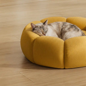 Lit rond pour chat et chien avec support de cou doux et lavable.